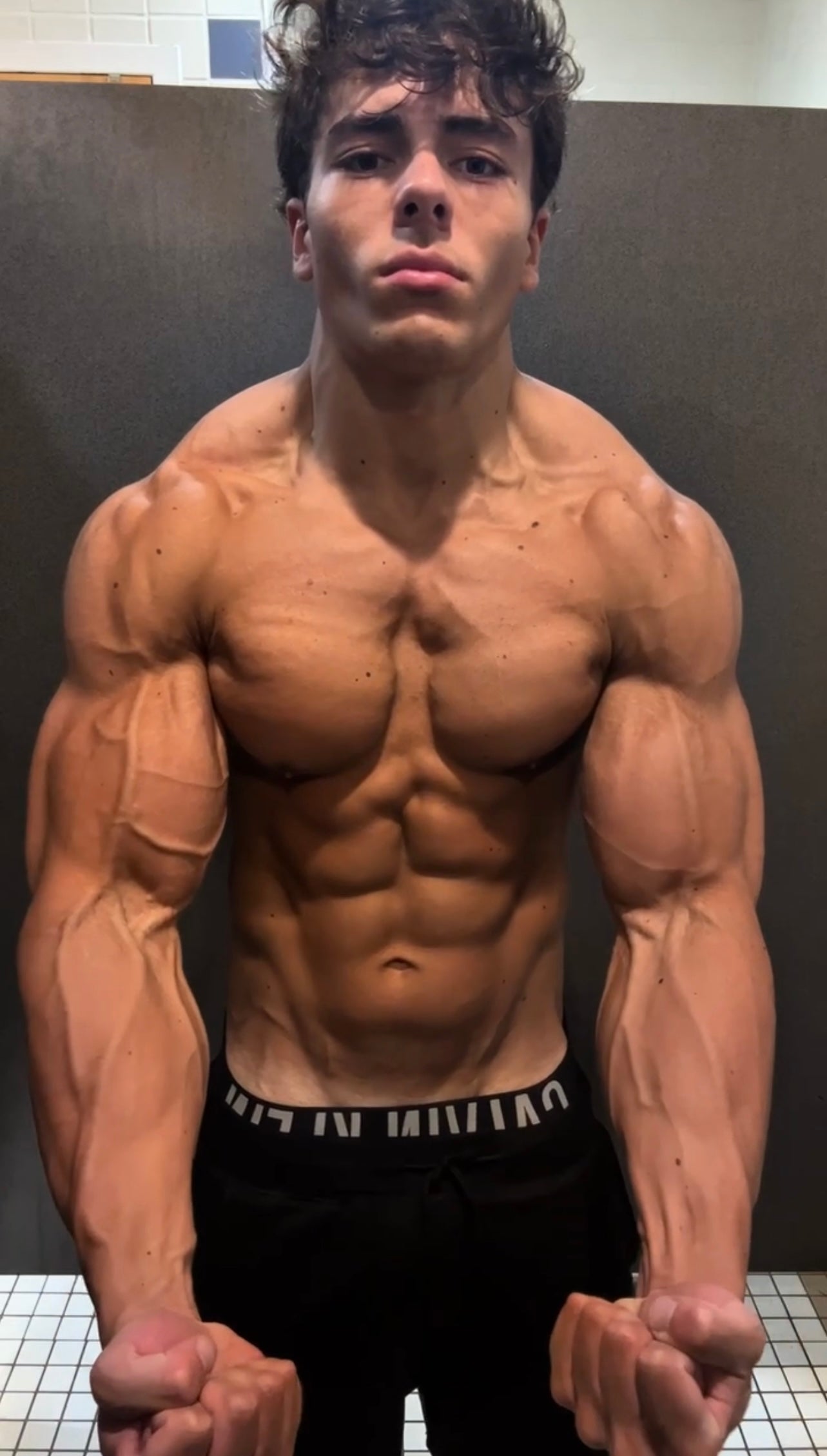 Niko flexing his physique, present day